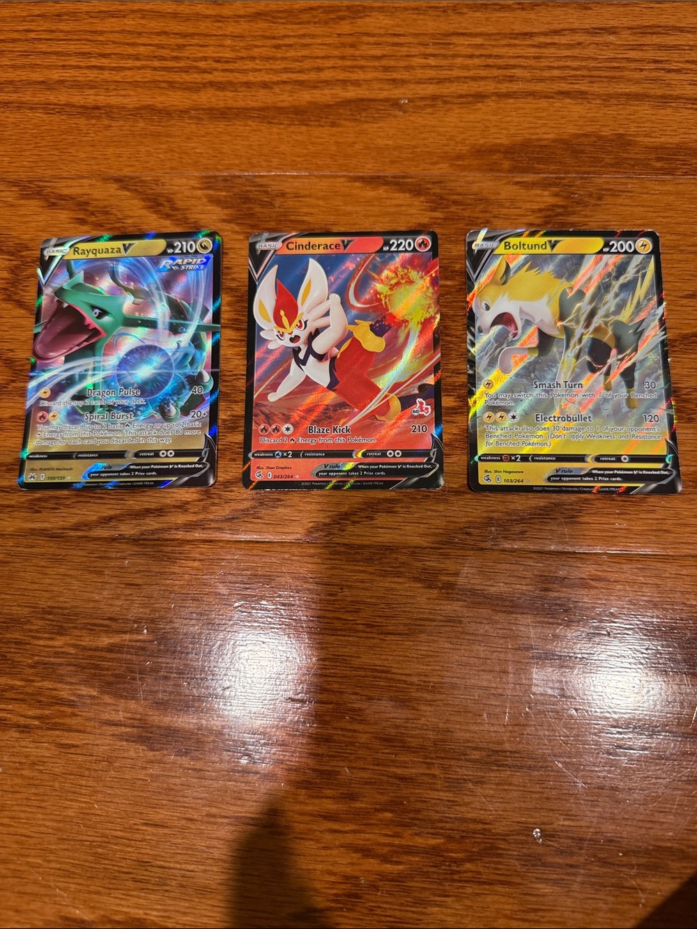 Ultra rare Pokémon TCG Full Art V Cards - Rayquaza V, Cinderace V, Boltund V